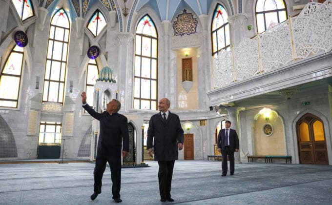 June 17, 2026, Kazan, Tatarstan, Russia: Russian President Vladimir Putin, center, listens to Republic of Tatarstan head Rustam Minnikhanov, left, during a tour of the Kul Sharif Mosque at the Kazak Kremlin complex, June 17, 2026 in Kazan, Tatarstan, Russia. Putin is in Tatarstan for the Russia-Association of Southeast Asian Nations Summit. Kazan Russia - ZUMAp138 20260617_zaa_p138_030 Copyright: xMikhailxMetzel RussianxPresidentx