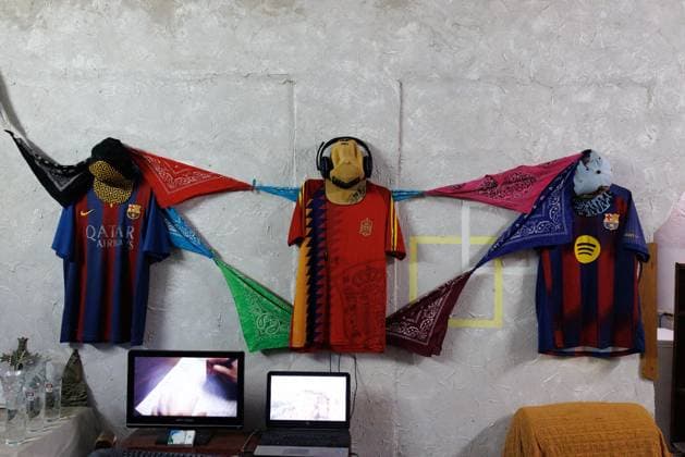 CUBA-HAVANA SOCIAL CRISIS AND WORLD CUP HAVANA, CUBA - JUNE 16, 2026: Football jerseys are displayed on a living room wall above portable computers streaming sports content in Havana, Cuba, on June 16, 2026. (Photo by Pablo Miranzo JNA Press via Nexpher Images) HAVANA