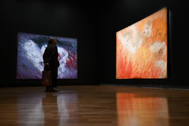 ARTHUR BOYD TAPESTRIES EXHIBITION, A guest takes a look at tapestries during a media preview of a major winter exhibition ˜Arthur Boyd: Tapestries™ at the National Gallery of Australia in Canberra, Thursday, June 18, 2026. At 2.5 by 3.4 metres, each tapestry features a scene from the life of St Francis of Assisi, one of the most venerated figures in history. ( NO ARCHIVING CANBERRA AUSTRALIAN CAPITAL TERRITORY AUSTRALIA  Copyright: xLUKASxCOCHx 20260618167349633917