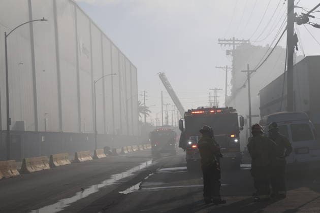 (260618) -- LOS ANGELES, June 18, 2026 -- Fire fighters work at a cold-storage facility where a fire has erupted in Boyle Heights, Los Angeles, California of the United States, on June 17, 2026. A shelter-in-place order was issued in the Boyle Heights area of Los Angeles on Wednesday as firefighters battled a massive fire that broke out at a commercial building. (Photo by Xinhua) (SpotNews) U.S.-LOS ANGELES-FIRE-SHELTER-IN-PLACE ORDER ZengxHui 