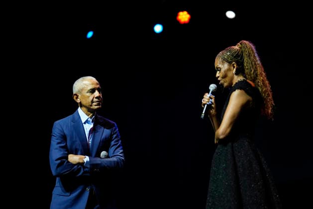 Former President Barack Obama and former first lady Michelle Obama appear on stage as they surprised administration and campaign alumni in Chicago ahead of the dedication ceremony of the Obama Presidential Center, Wednesday, June 17, 2026. Pool  CHX20260617210 PabloxMartinezxMonsivais