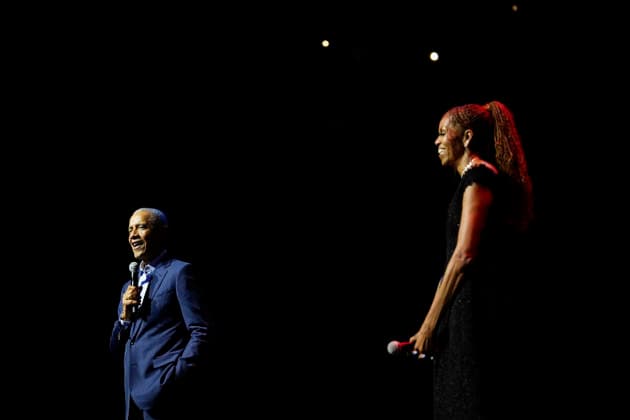 Former President Barack Obama and former first lady Michelle Obama appear on stage as they surprised administration and campaign alumni in Chicago ahead of the dedication ceremony of the Obama Presidential Center, Wednesday, June 17, 2026. Pool  CHX20260617211 PabloxMartinezxMonsivais