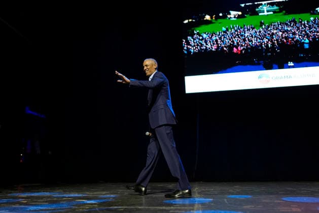 Former President Barack Obama gestures as he walks off stage after surprising administration and campaign alumni in Chicago ahead of the dedication ceremony of the Obama Presidential Center, Wednesday, June 17, 2026. Pool  CHX20260617217 PabloxMartinezxMonsivais