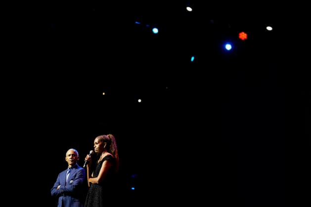 Former President Barack Obama and former first lady Michelle Obama appear on stage as they surprised administration and campaign alumni in Chicago ahead of the dedication ceremony of the Obama Presidential Center, Wednesday, June 17, 2026. Pool  CHX20260617202 PabloxMartinezxMonsivais