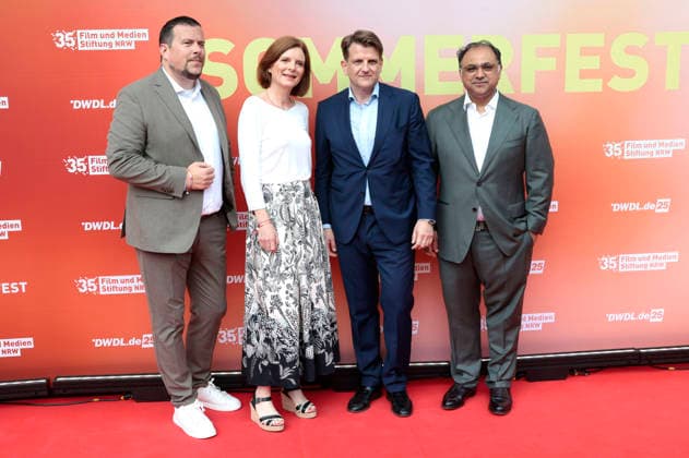 Thomas Lückerath, Katrin Vernau, Leopold Hoesch und Walid Nakschbandi beim Sommerfest zum 35-jährigen Bestehen der Film- und Medienstiftung NRW im Park CafÃ . Köln, 17.06.2026 *** Thomas Lückerath, Katrin Vernau, Leopold Hoesch, and Walid Nakschbandi at the summer party celebrating the 35th anniversary of the Film and Media Foundation NRW at Park Café in Cologne, June 17, 2026,detected_source_language Foto:xR.xSchmiegeltx xFuturexImagex nrw_sommerfest_6639