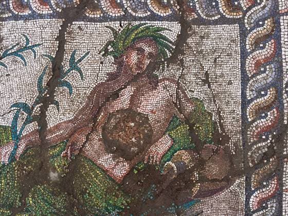 Depiction of the 3rd-Century river god Young Eurymedon discovered in Aspendos ANTALYA, TURKIYE - JUNE 18: (----EDITORIAL USE ONLY MANDATORY CREDIT - TURKISH MINISTRY OF CULTURE AND TOURISM HANDOUT - NO MARKETING NO ADVERTISING CAMPAIGNS - DISTRIBUTED AS A SERVICE TO CLIENTS----) Archaeologists uncover a mosaic-decorated architectural structure measuring approximately 6 by 25 meters during excavations carried out in the eastern square of Theatre Street, which connects the Acropolis of Aspendos with the theater in Antalya, Turkiye on June 18, 2026. Based on its iconographic features and comparable examples, the figure is identified as the Young Eurymedon, the river god of Aspendos, symbolizing the Eurymedon River that gave life to the  Copyright: x2026xAnadoluxTurxMinistryxofxCulturexandxTourismx