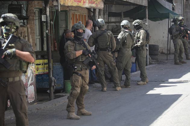 Israeli army raids Balata refugee camp near Nablus Israeli army forces raid Balata refugee camp, east of Nablus in the West Bank, on June 18, 2026. According to local sources, Israeli forces stormed the market during a military operation and detained several Palestinians. Photo by Mohammed Nasser apaimages Nablus West Bank Palestinian Territory 180626_Nablus_MN_00(2) Copyright: xapaimagesxMohammedxNasserx xapaimagesx