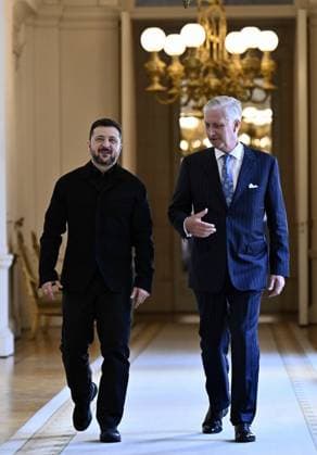 Ukraine president Volodymyr Zelensky and King Philippe - Filip of Belgium pictured before a lunch at the Royal Palace, on Thursday 18 June 2026 in Brussels.  ERICxLALMAND 178040711