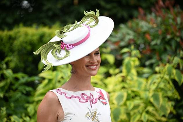 Royal Ascot 2026 BERKSHIRE, UNITED KINGDOM - JUNE 18: Visitors wearing elaborate hats and elegant outfits attend the third day of the traditional Royal Ascot horse racing event, held in the United Kingdom since 1711, at Ascot Racecourse in Berkshire, United Kingdom on June 18, 2026. Rasid Necati Aslim Anadolu Berkshire United Kingdom. Editorial use only. Please get in touch for any other usage.  Copyright: x2026xAnadoluxRasidxNecatixAslimx