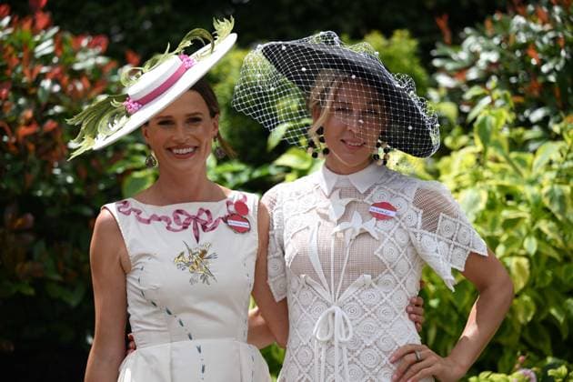 Royal Ascot 2026 BERKSHIRE, UNITED KINGDOM - JUNE 18: Visitors wearing elaborate hats and elegant outfits attend the third day of the traditional Royal Ascot horse racing event, held in the United Kingdom since 1711, at Ascot Racecourse in Berkshire, United Kingdom on June 18, 2026. Rasid Necati Aslim Anadolu Berkshire United Kingdom. Editorial use only. Please get in touch for any other usage.  Copyright: x2026xAnadoluxRasidxNecatixAslimx