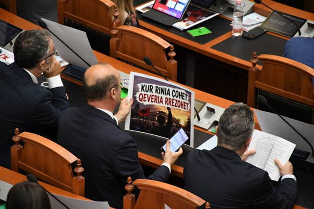 Opposition MPs in Albania block the parliamentary podium TIRANA, ALBANIA - JUNE 18: Opposition MPs unfurl banners in support of the demonstrations as session of the Albanian Parliament is interrupted several times after MPs from the main opposition party, the Democratic Party (PD), block the podium in Tirana, Albania on June 18, 2026. The agenda for the parliamentary session included a briefing by Ferit Hoxha, Minister for European and Foreign Affairs, on the country’s accession negotiations with the European Union (EU), and the discussion of several draft laws. After Parliamentary Speaker Niko Peleshi gave the floor to Minister Hoxha, PD MPs blocked the podium, demanding that the floor be given to the party’s leader, Sali Berisha. Olsi She  Copyright: x2026xAnadoluxOlsixShehux