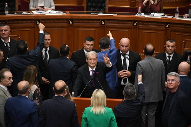 Opposition MPs in Albania block the parliamentary podium TIRANA, ALBANIA - JUNE 18: A view from the session of the Albanian Parliament as it is interrupted several times after MPs from the main opposition party, the Democratic Party (PD), block the podium in Tirana, Albania on June 18, 2026. The agenda for the parliamentary session included a briefing by Ferit Hoxha, Minister for European and Foreign Affairs, on the country’s accession negotiations with the European Union (EU), and the discussion of several draft laws. After Parliamentary Speaker Niko Peleshi gave the floor to Minister Hoxha, PD MPs blocked the podium, demanding that the floor be given to the party’s leader, Sali Berisha. Olsi Shehu Anadolu Tirana Albania. Editorial use o  Copyright: x2026xAnadoluxOlsixShehux