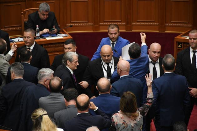 Opposition MPs in Albania block the parliamentary podium TIRANA, ALBANIA - JUNE 18: A view from the session of the Albanian Parliament as it is interrupted several times after MPs from the main opposition party, the Democratic Party (PD), block the podium in Tirana, Albania on June 18, 2026. The agenda for the parliamentary session included a briefing by Ferit Hoxha, Minister for European and Foreign Affairs, on the country’s accession negotiations with the European Union (EU), and the discussion of several draft laws. After Parliamentary Speaker Niko Peleshi gave the floor to Minister Hoxha, PD MPs blocked the podium, demanding that the floor be given to the party’s leader, Sali Berisha. Olsi Shehu Anadolu Tirana Albania. Editorial use o  Copyright: x2026xAnadoluxOlsixShehux