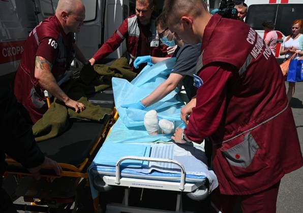 Belarus Russia Ukraine Bus Attack Hospital 9191411 18.06.2026 Medics wheel a child injured in a Ukrainian drone strike on a passenger bus carrying Belarusian citizens in Russia™s Bryansk region outside the Republican Scientific and Practical Centre for Pediatric Surgery in Minsk, Belarus. RIA Novosti Sputnik Minsk Belarus  Copyright: xRIAxNovostix