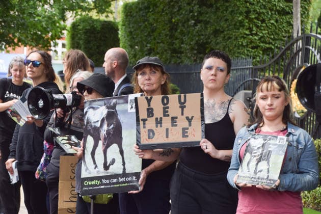June 18, 2026, Ascot, England, United Kingdom: Animal rights activists from the group Animal Aid stage a protest outside Ascot Racecourse during Royal Ascot 2026, calling for an end to horse racing. Campaigners say that over 200 racehorses die each year in the UK. Ascot United Kingdom  - ZUMAv130 20260618_zip_v130_011 Copyright: xVukxValcicx