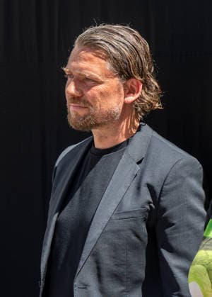 Muenchen bei der Praesentation des Bauzaunes, Start in die Bauphase, Marek Wiechers, Kulturreferent *** Munich at the unveiling of the construction fence, marking the start of the construction phase; Marek Wiechers, Director of Cultural Affairs,detected_source_language