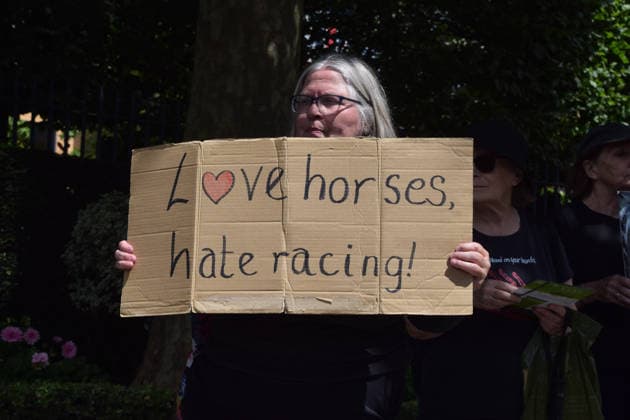 June 18, 2026, Ascot, England, United Kingdom: Animal rights activists from the group Animal Aid stage a protest outside Ascot Racecourse during Royal Ascot 2026, calling for an end to horse racing. Campaigners say that around 200 racehorses die each year in the UK. Ascot United Kingdom  - ZUMAv130 20260618_zip_v130_024 Copyright: xVukxValcicx