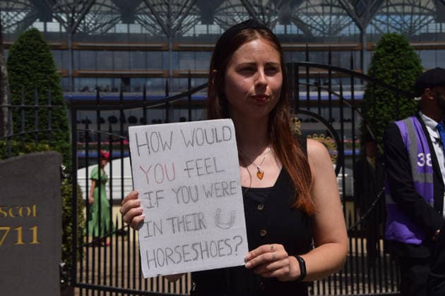 June 18, 2026, Ascot, England, United Kingdom: Animal rights activists from the group Animal Aid stage a protest outside Ascot Racecourse during Royal Ascot 2026, calling for an end to horse racing. Campaigners say that around 200 racehorses die each year in the UK. Ascot United Kingdom  - ZUMAv130 20260618_zip_v130_025 Copyright: xVukxValcicx