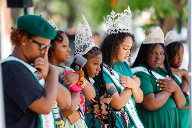 June 18, 2026, Tampa, Florida, USA: The Juneteenth Royal Court bows their heads for the invocation during the annual Juneteenth Flag-Raising ceremony outside the Fred B. Karl County Center on Thursday, June 18, 2026, in Tampa. Tampa USA - ZUMAs70_ 20260618_zan_s70_006 Copyright: xJeffereexWoox
