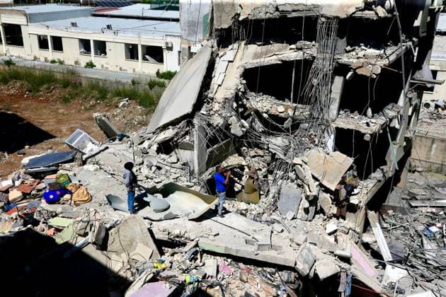 (260618) -- NABATIEH, June 18, 2026 -- Photo taken on June 18, 2026 shows people inspecting their destroyed homes after Israeli attacks in Nabatieh, southern Lebanon. (Photo by Xinhua) LEBANON-NABATIEH-ISRAELI ATTACKS-AFTERMATH AlixHashisho 