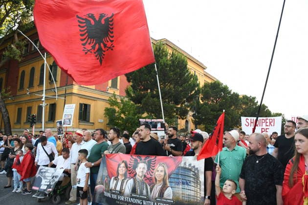 Anti-tourism project protests continue for 19th day in Albania TIRANA, ALBANIA - JUNE 18: Protests against a planned tourism project in the Zvernec area of the coastal city of Vlora continue for a 19th consecutive day in Tirana, Albania on June 18, 2026. Demonstrators gathered in Skanderbeg Square under the slogan Albania is not for sale, with a large number of participants joining the rally. Protesters opposed the reported sale of a beach in Zvernec as part of a tourism project allegedly linked to Ivanka Trump and Jared Kushner. Carrying banners, placards, and Albanian flags, demonstrators marched along the Boulevard of the Martyrs of the Nation toward the Prime Minister’s Office. Olsi Shehu Anadolu Tirana Albania. Editorial use only.  Copyright: x2026xAnadoluxOlsixShehux