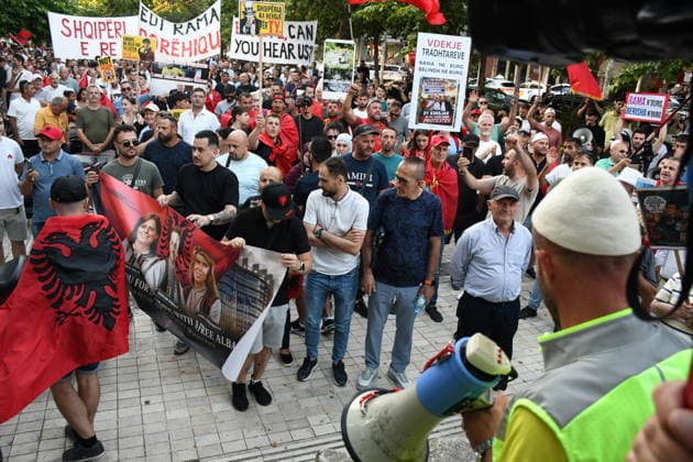 Anti-tourism project protests continue for 19th day in Albania TIRANA, ALBANIA - JUNE 18: Protests against a planned tourism project in the Zvernec area of the coastal city of Vlora continue for a 19th consecutive day in Tirana, Albania on June 18, 2026. Demonstrators gathered in Skanderbeg Square under the slogan Albania is not for sale, with a large number of participants joining the rally. Protesters opposed the reported sale of a beach in Zvernec as part of a tourism project allegedly linked to Ivanka Trump and Jared Kushner. Carrying banners, placards, and Albanian flags, demonstrators marched along the Boulevard of the Martyrs of the Nation toward the Prime Minister’s Office. Olsi Shehu Anadolu Tirana Albania. Editorial use only.  Copyright: x2026xAnadoluxOlsixShehux