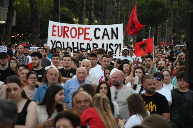 Anti-tourism project protests continue for 19th day in Albania TIRANA, ALBANIA - JUNE 18: Protests against a planned tourism project in the Zvernec area of the coastal city of Vlora continue for a 19th consecutive day in Tirana, Albania on June 18, 2026. Demonstrators gathered in Skanderbeg Square under the slogan Albania is not for sale, with a large number of participants joining the rally. Protesters opposed the reported sale of a beach in Zvernec as part of a tourism project allegedly linked to Ivanka Trump and Jared Kushner. Carrying banners, placards, and Albanian flags, demonstrators marched along the Boulevard of the Martyrs of the Nation toward the Prime Minister’s Office. Olsi Shehu Anadolu Tirana Albania. Editorial use only.  Copyright: x2026xAnadoluxOlsixShehux