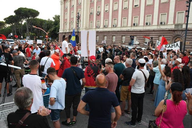 Anti-tourism project protests continue for 19th day in Albania TIRANA, ALBANIA - JUNE 18: Protests against a planned tourism project in the Zvernec area of the coastal city of Vlora continue for a 19th consecutive day in Tirana, Albania on June 18, 2026. Demonstrators gathered in Skanderbeg Square under the slogan Albania is not for sale, with a large number of participants joining the rally. Protesters opposed the reported sale of a beach in Zvernec as part of a tourism project allegedly linked to Ivanka Trump and Jared Kushner. Carrying banners, placards, and Albanian flags, demonstrators marched along the Boulevard of the Martyrs of the Nation toward the Prime Minister’s Office. Olsi Shehu Anadolu Tirana Albania. Editorial use only.  Copyright: x2026xAnadoluxOlsixShehux