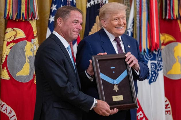 June 18, 2026, Washington, Disitrirct Of Columbia, United States: Family members of retired U.S. Marine Corps Colonel John W. Ripley accept the Medal of Honor during a ceremony hosted by President Donald Trump in the East Room of the White House in Washington, D.C., on Thursday, June 18, 2026. Ripley was posthumously recognized for acts of gallantry and intrepidity above and beyond the call of duty while serving in the Republic of Vietnam on April 2, 1972. Washington United States - ZUMAk206 20260618_znp_k206_028 Copyright: xMattxKaminskyx