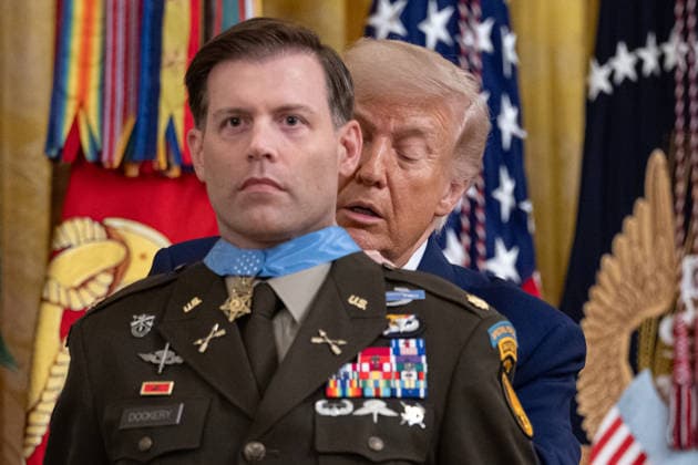 June 18, 2026, Washington, Disitrirct Of Columbia, United States: Retired U.S. Army Major Nicholas Dockery receives the Medal of Honor during a ceremony hosted by President Donald Trump in the East Room of the White House in Washington, D.C., on Thursday, June 18, 2026. Dockery was recognized for acts of gallantry and intrepidity above and beyond the call of duty while serving in Kapisa Province, Afghanistan, on October 2, 2012. Washington United States - ZUMAk206 20260618_znp_k206_029 Copyright: xMattxKaminskyx