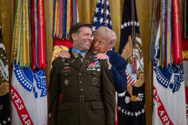 June 18, 2026, Washington, Disitrirct Of Columbia, United States: Retired U.S. Army Major Nicholas Dockery receives the Medal of Honor during a ceremony hosted by President Donald Trump in the East Room of the White House in Washington, D.C., on Thursday, June 18, 2026. Dockery was recognized for acts of gallantry and intrepidity above and beyond the call of duty while serving in Kapisa Province, Afghanistan, on October 2, 2012. Washington United States - ZUMAk206 20260618_znp_k206_032 Copyright: xMattxKaminskyx