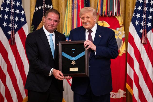 President Donald Trump presents a Medal of Honor to Tom Ripley on behalf of his father John W. Ripley during a Medal of Honor award ceremony in the East Room of the White House in Washington DC on Thursday, June 18, 2026.  WAX20260618518 AaronxSchwartz