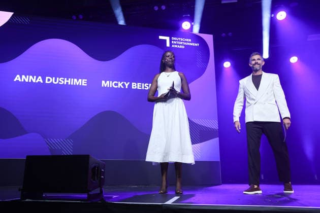 Anna Dushime and Micky Beisenherz attend the German Entertainment Award ceremony on June 18, 2026, in Cologne, Germany Deutscher Entertainment Award in Cologne, Germany *** Anna Dushime and Micky Beisenherz attend the German Entertainment Award ceremony on June 18, 2026, in Cologne, Germany German Entertainment Award in Cologne, Germany,detected_source_language