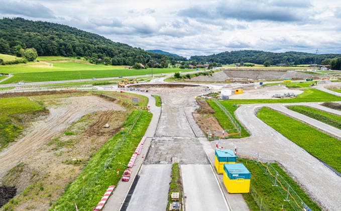 Drone footage of the major infrastructure construction site in G Glattfelden, Switzerland, 7th Jul 2024: Drone footage of the major construction site at the Chrüzstrasse roundabout. The expansion of Schaffhauserstrasse in the Zurich lowlands shows the current construction progress and the future traffic flow from above. *** Drone footage of the major infrastructure construction site in G Glattfelden, Switzerland, July 7, 2024. Drone footage of the major construction site at the Chrüzstrasse roundabout. The expansion of Schaffhauserstrasse in the Zurich lowlands shows the current construction progress and the future traffic flow from above.,detected_source_language Copyright: xAndreasxHaasx