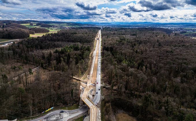 Drone footage of the major infrastructure construction site in G Glattfelden, Switzerland, 23rd Mar 2025: Drone footage of the major construction site at the Chrüzstrasse roundabout. The expansion of Schaffhauserstrasse in the Zurich lowlands shows the current construction progress and the future traffic flow from above. *** Drone footage of the major infrastructure construction site in G Glattfelden, Switzerland, March 23, 2025. Drone footage of the major construction site at the Chrüzstrasse roundabout. The expansion of Schaffhauserstrasse in the Zurich lowlands shows the current construction progress and the future traffic flow from above.,detected_source_language Copyright: xAndreasxHaasx