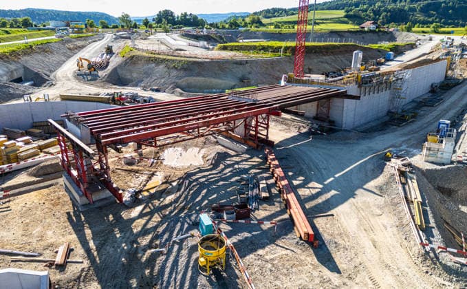 Drone footage of the major infrastructure construction site in G Glattfelden, Switzerland, 11th May 2025: Drone footage of the major construction site at the Chrüzstrasse roundabout. The expansion of Schaffhauserstrasse in the Zurich lowlands shows the current construction progress and the future traffic flow from above. *** Drone footage of the major infrastructure construction site in G Glattfelden, Switzerland, May 11, 2025. Drone footage of the major construction site at the Chrüzstrasse roundabout. The expansion of Schaffhauserstrasse in the Zurich lowlands shows the current construction progress and the future traffic flow from above.,detected_source_language Copyright: xAndreasxHaasx