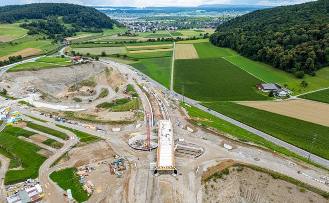 Drone footage of the major infrastructure construction site in G Glattfelden, Switzerland, 3rd Aug 2025: Drone footage of the major construction site at the Chrüzstrasse roundabout. The expansion of Schaffhauserstrasse in the Zurich lowlands shows the current construction progress and the future traffic flow from above. *** Drone footage of the major infrastructure construction site in G Glattfelden, Switzerland, August 3, 2025. Drone footage of the major construction site at the Chrüzstrasse roundabout. The expansion of Schaffhauserstrasse in the Zurich lowlands shows the current construction progress and the future traffic flow from above.,detected_source_language Copyright: xAndreasxHaasx