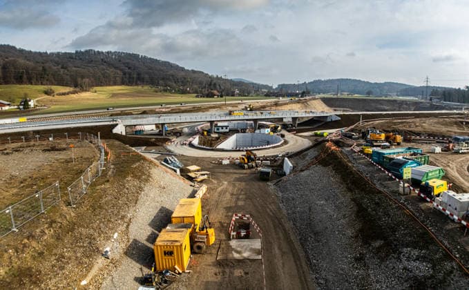 Drone footage of the major infrastructure construction site in G Glattfelden, Switzerland, 25th Jan 2026: Drone footage of the major construction site at the Chrüzstrasse roundabout. The expansion of Schaffhauserstrasse in the Zurich lowlands shows the current construction progress and the future traffic flow from above. *** Drone footage of the major infrastructure construction site in G Glattfelden, Switzerland, January 25, 2026. Drone footage of the major construction site at the Chrüzstrasse roundabout. The expansion of Schaffhauserstrasse in the Zurich lowlands shows the current construction progress and the future traffic flow from above.,detected_source_language Copyright: xAndreasxHaasx
