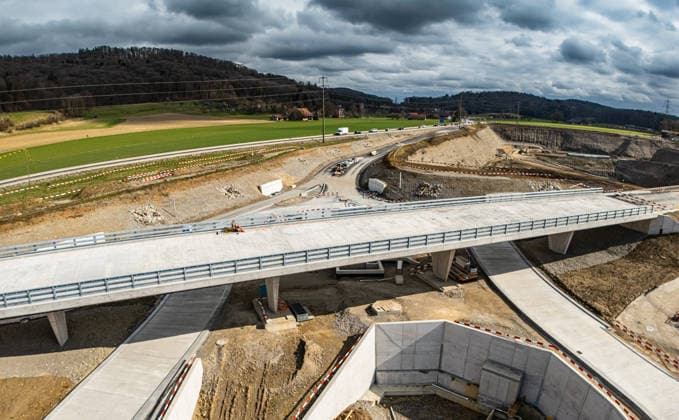 Drone footage of the major infrastructure construction site in G Glattfelden, Switzerland, 1st Mar 2026: Drone footage of the major construction site at the Chrüzstrasse roundabout. The expansion of Schaffhauserstrasse in the Zurich lowlands shows the current construction progress and the future traffic flow from above. *** Drone footage of the major infrastructure construction site in G Glattfelden, Switzerland, March 1, 2026. Drone footage of the major construction site at the Chrüzstrasse roundabout. The expansion of Schaffhauserstrasse in the Zurich lowlands shows the current construction progress and the future traffic flow from above.,detected_source_language Copyright: xAndreasxHaasx