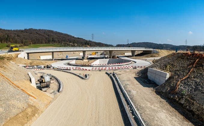 Drone footage of the major infrastructure construction site in G Glattfelden, Switzerland, 22nd Mar 2026: Drone footage of the major construction site at the Chrüzstrasse roundabout. The expansion of Schaffhauserstrasse in the Zurich lowlands shows the current construction progress and the future traffic flow from above. *** Drone footage of the major infrastructure construction site in G Glattfelden, Switzerland, March 22, 2026. Drone footage of the major construction site at the Chrüzstrasse roundabout. The expansion of Schaffhauserstrasse in the Zurich lowlands shows the current construction progress and the future traffic flow from above.,detected_source_language Copyright: xAndreasxHaasx