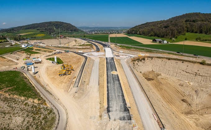 Drone footage of the major infrastructure construction site in G Glattfelden, Switzerland, 11th Apr 2026: Drone footage of the major construction site at the Chrüzstrasse roundabout. The expansion of Schaffhauserstrasse in the Zurich lowlands shows the current construction progress and the future traffic flow from above. *** Drone footage of the major infrastructure construction site in G Glattfelden, Switzerland, April 11, 2026. Drone footage of the major construction site at the Chrüzstrasse roundabout. The expansion of Schaffhauserstrasse in the Zurich lowlands shows the current construction progress and the future traffic flow from above.,detected_source_language Copyright: xAndreasxHaasx
