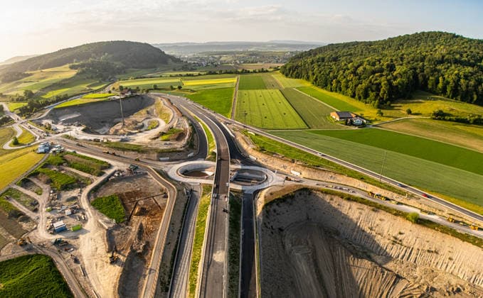 Drone footage of the major infrastructure construction site in G Glattfelden, Switzerland, 25th May 2026: Drone footage of the major construction site at the Chrüzstrasse roundabout. The expansion of Schaffhauserstrasse in the Zurich lowlands shows the current construction progress and the future traffic flow from above. *** Drone footage of the major infrastructure construction site in G Glattfelden, Switzerland, May 25, 2026. Drone footage of the major construction site at the Chrüzstrasse roundabout. The expansion of Schaffhauserstrasse in the Zurich lowlands shows the current construction progress and the future traffic flow from above.,detected_source_language Copyright: xAndreasxHaasx