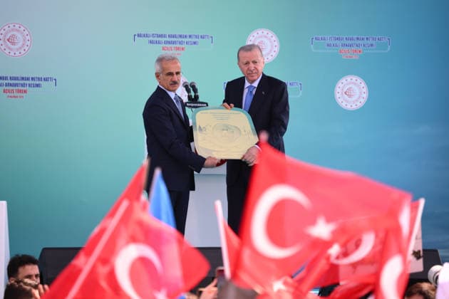 Turkish President Recep Tayyip Erdogan ISTANBUL, TURKIYE - JUNE 19: Turkish President Recep Tayyip Erdogan (R) presented a gift by Turkish Minister of Transport Abdulkadir Uraloglu (L) during the Opening Ceremony of Halkali-Istanbul Airport Metro Line at the Kayasehir Metro Station, in Istanbul, Turkiye, on June 19, 2026. Arif Hudaverdi Yaman Anadolu Istanbul Turkey. Editorial use only. Please get in touch for any other usage.  Copyright: x2026xAnadoluxArifxHudaverdixYamanx
