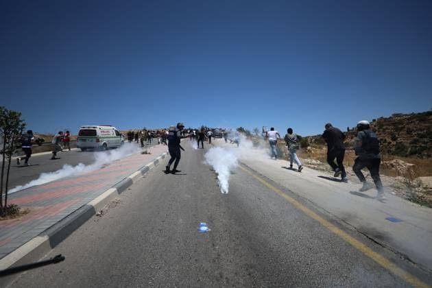 Israeli Forces Disperse Protest During Friday Prayers in Dura DURA, WEST BANK JUNE 19, 2026: Palestinians perform Friday prayers in protest against the seizure of Jabal Tarousa and the establishment of a settlement outpost in the town of Dura, south of Hebron. Israeli forces dispersed the gathering by firing tear gas canisters, causing several Palestinians, including journalists, to suffer from tear gas inhalation. Photo by Mosab Shawer JNA Press. (Photo by Mosab shawer JNA Press via Nexpher Images) DURA