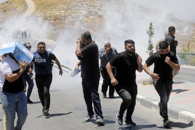 Palestinians protest planned settlement expansion in Hebron HEBRON, WEST BANK - JULY 19: Palestinians protest plans for a new settlement project announced by Israeli Finance Minister Bezalel Smotrich in the town of Dura, south of Hebron, West Bank, Palestine on June 19, 2026. Demonstrators gathered in the Jabal Tarusa area to oppose the planned settlement expansion. Israeli forces intervened using stun grenades and tear gas, prompting some protesters to leave the area. Mamoun Wazwaz Anadolu Hebron West Bank. Editorial use only. Please get in touch for any other usage.  Copyright: x2026xAnadoluxMamounxWazwazx