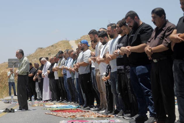 Palestinians protest planned settlement expansion in Hebron HEBRON, WEST BANK - JULY 19: Palestinians protest plans for a new settlement project announced by Israeli Finance Minister Bezalel Smotrich in the town of Dura, south of Hebron, West Bank, Palestine on June 19, 2026. Demonstrators gathered in the Jabal Tarusa area to oppose the planned settlement expansion. Israeli forces intervened using stun grenades and tear gas, prompting some protesters to leave the area. Mamoun Wazwaz Anadolu Hebron West Bank. Editorial use only. Please get in touch for any other usage.  Copyright: x2026xAnadoluxMamounxWazwazx