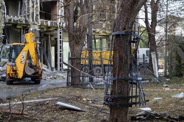 Volunteers Remove Debris at Dovzhenko Film Studio in Kyiv An iron fence ripped out of the ground by the shockwave from the Russian strike is wrapped around a nearby tree at the Oleksandr Dovzhenko National Film Studio, Kyiv, Ukraine, June 19, 2026. The studio sustained considerable damage during the large-scale Russian missile and drone attack on the capital on June 15. The costume shop, which housed the largest and oldest costume collection in Ukraine, suffered the most destruction. Its storage contained around 100,000 costumes created for films across different decades, as well as approximately three million pieces of props. Other buildings of the film studio were also damaged. Photo by Marianna Kotyk Ukrinform ABACAPRESS.COM Kyiv Ukrai  Copyright: xUkrinform ABACAx