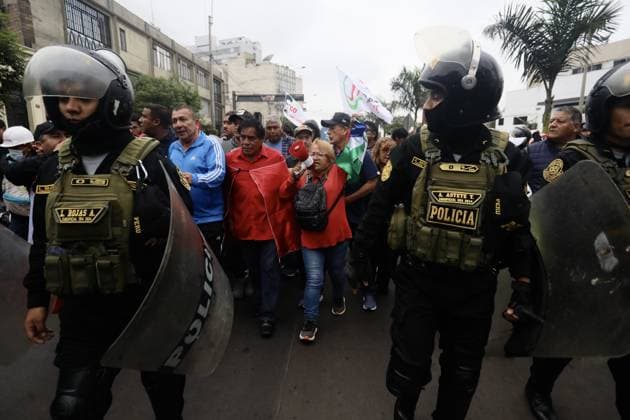 Supporters march with Roberto Sanchez in Lima amid vote count dispute LIMA, PERU - JUNE 19: Security teams take safety measures as thousands of citizens march alongside presidential candidate Roberto Sanchez in Lima, Peru, on June 19, 2026. Sanchez joined the demonstration with supporters calling for transparency in the electoral process and backing claims raised by his political movement as the official vote count continues. The march took place amid questions over the vote tally and the handling of some electoral records. With 99.5 percent of ballots counted, Sánchez trails Keiko Fujimori by approximately 40,000 votes. Klebher Vasquez Anadolu Lima Peru. Editorial use only. Please get in touch for any other usage.  Copyright: x2026xAnadoluxKlebherxVasquezx