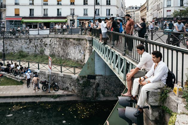 Parisians During The Heat Wave People swim and dive in the Canal Saint-Martin in Paris, France, on June 19, 2026, as a heatwave affects the country. Temperatures are expected to reach up to 40?C in some areas on June 21, the first day of summer. Paris France  Copyright: xJeromexGillesx originalFilename: chobeaux-notitle260620_npNwA.jpg