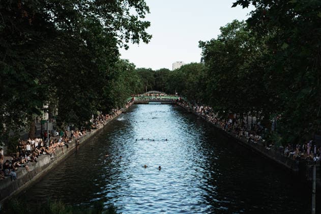 Parisians During The Heat Wave People swim and dive in the Canal Saint-Martin in Paris, France, on June 19, 2026, as a heatwave affects the country. Temperatures are expected to reach up to 40?C in some areas on June 21, the first day of summer. Paris France  Copyright: xJeromexGillesx originalFilename: chobeaux-notitle260620_npv9t.jpg